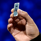 Intel Senior Vice President and General Manager Client Computing Group Gregory Bryant displays an Ice Lake chip during an Intel press event for CES 2019.